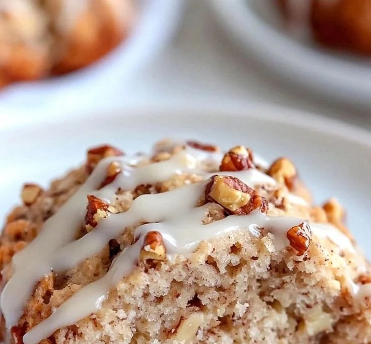 Delicious banana bread scones on a plate with a fork.