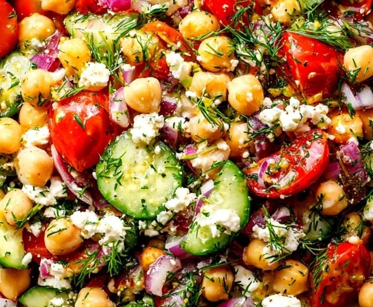 Delicious chickpea cucumber salad with fresh ingredients in a bowl