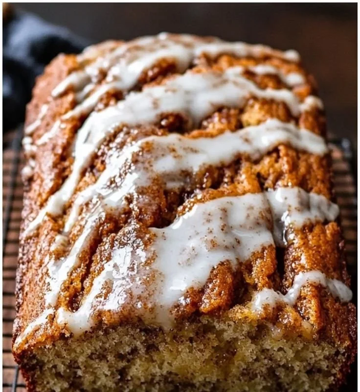 Delicious cinnamon swirl banana bread baked with ripe bananas and aromatic spices.