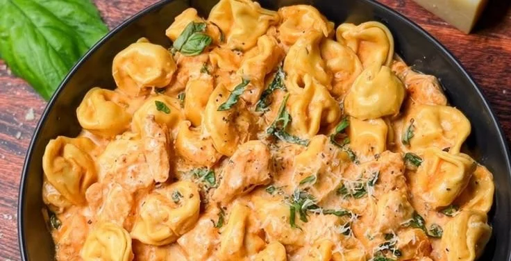 Delicious CrockPot Chicken Tortellini served in a bowl