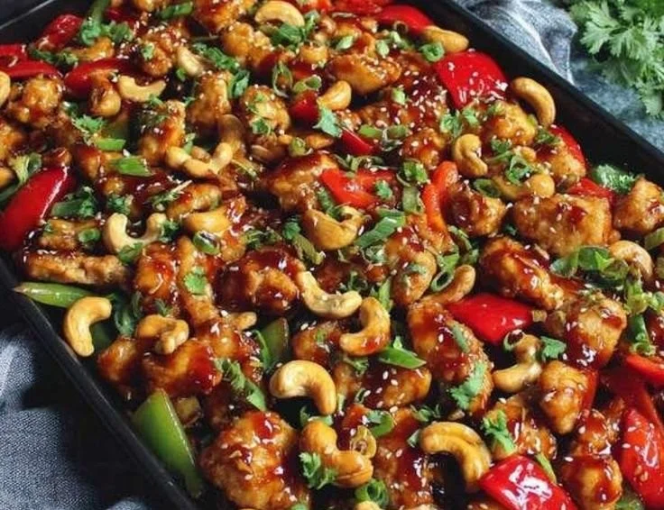 Delicious Easy Sheet Pan Cashew Chicken meal prepared on a baking sheet