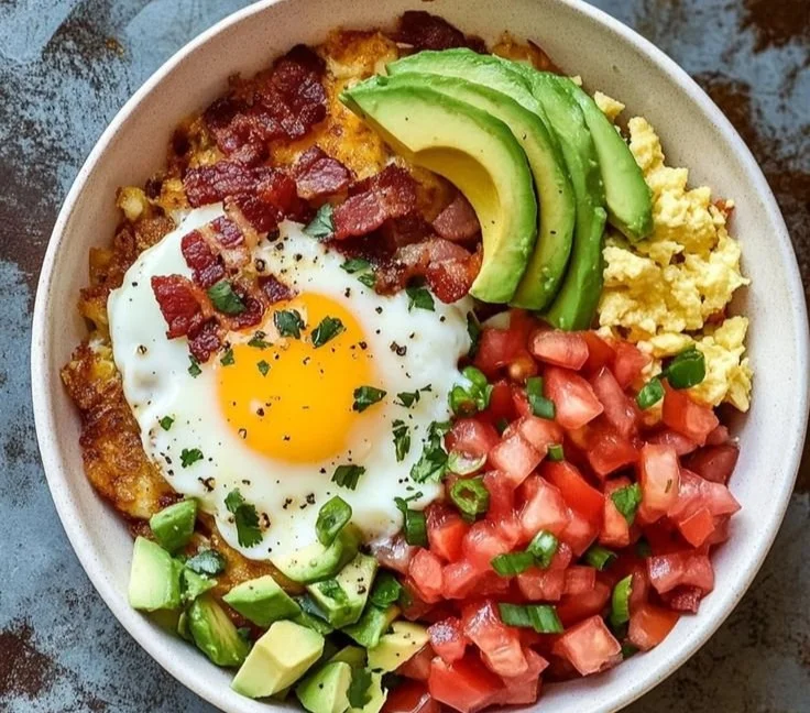 High protein breakfast bowls with eggs, yogurt, and fresh fruits for a healthy meal.