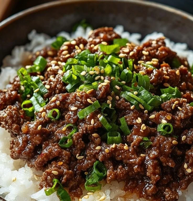Delicious Korean Ground Beef Bowl topped with green onions and sesame seeds.