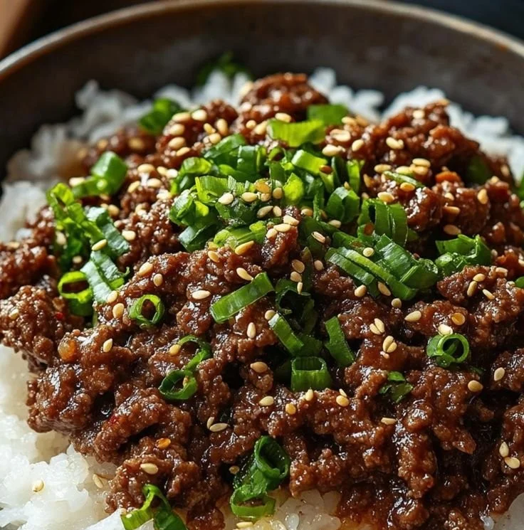 Korean Ground Beef Bowl with vegetables and sauce served in a bowl