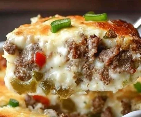 Low Carb Philly Cheesesteak Casserole served in a dish with toppings