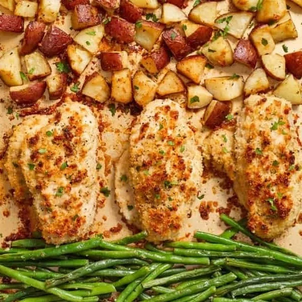 Parmesan Crusted Chicken Sheet Pan Dinner with vegetables ready to serve.