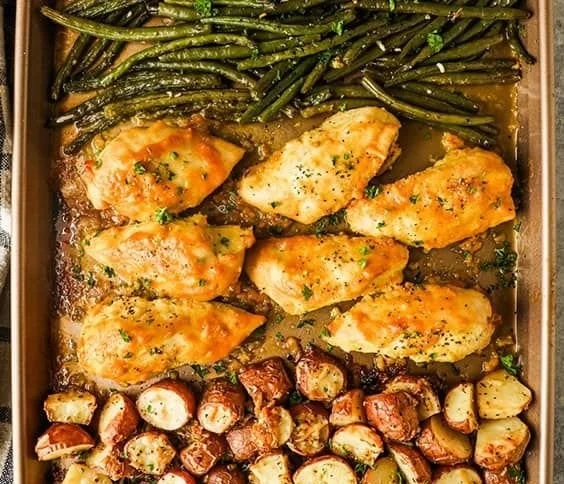 Sheet Pan Honey Mustard Chicken with vegetables on a baking tray